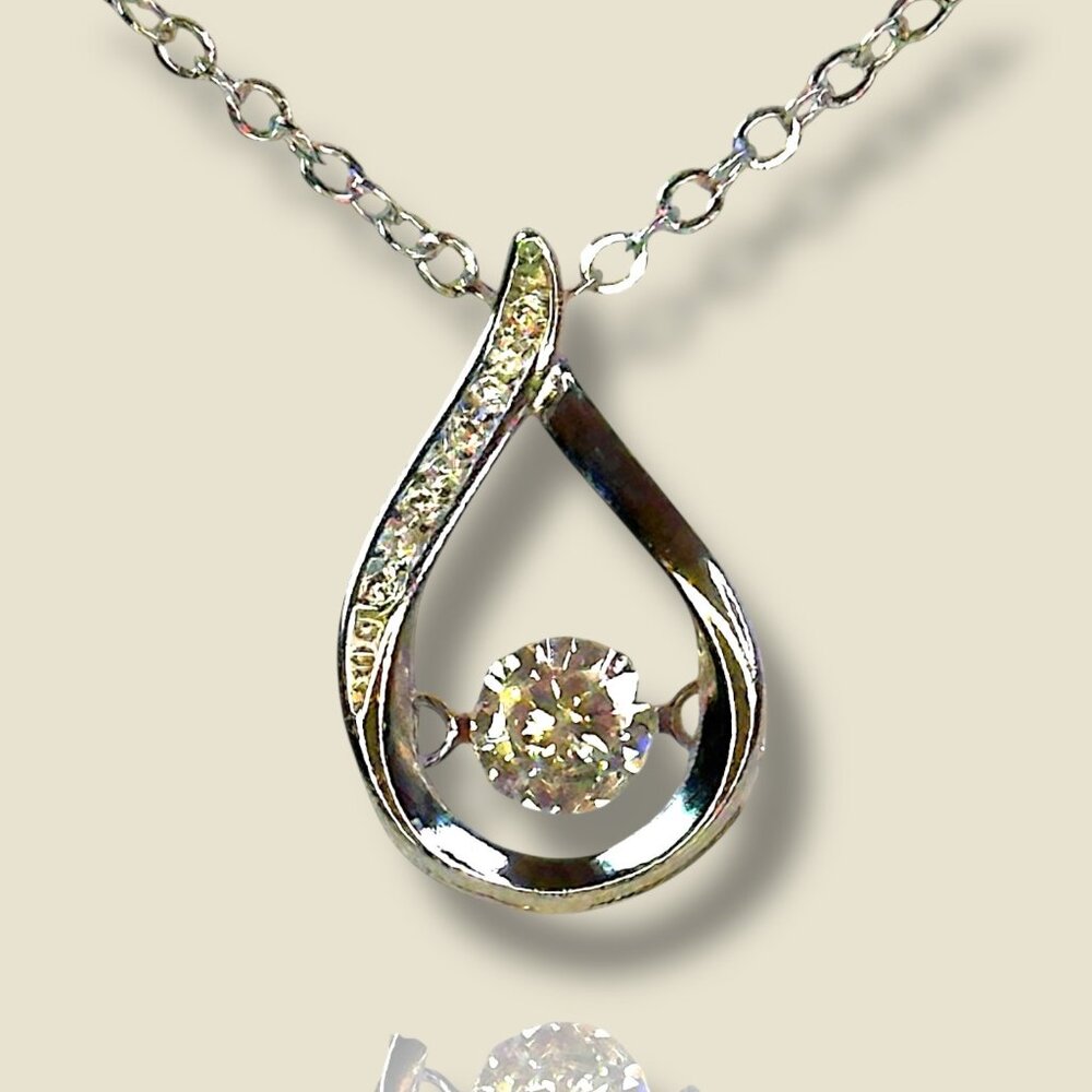 Sterling Silver Teardrop Pendant Necklace With Sparkling Dancing Cubic Zirconia